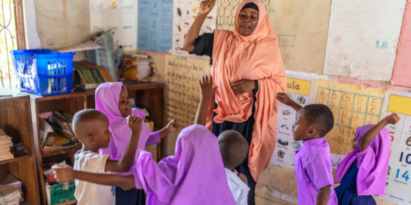 Teachers can learn from each other and come to see that they are inclusive educators. zeljkosantrac/Getty Images